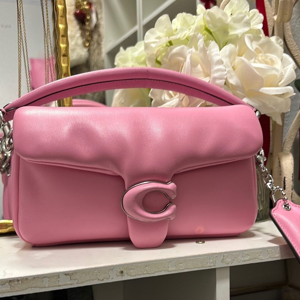 Coach Pink pillow tabby 20 Shoulder Bag. I don’t the cross body strap